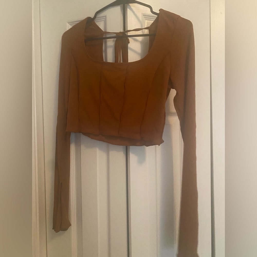 Brown cropped long sleeve with open tied back